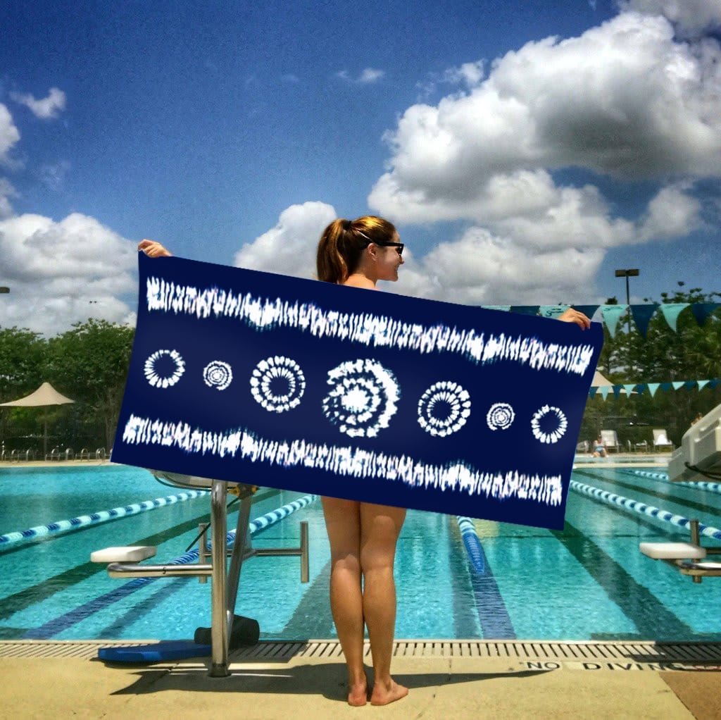 snappy eco collection sport towel woman at pool