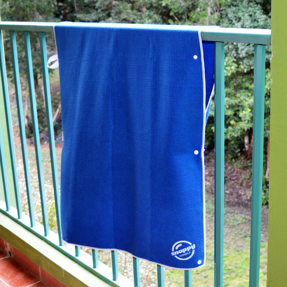 Snappy Towels can be attached to a railing, clothes line or rope while camping or sailing, and will dry quickly without risk of blowing away, no clothes pegs required!