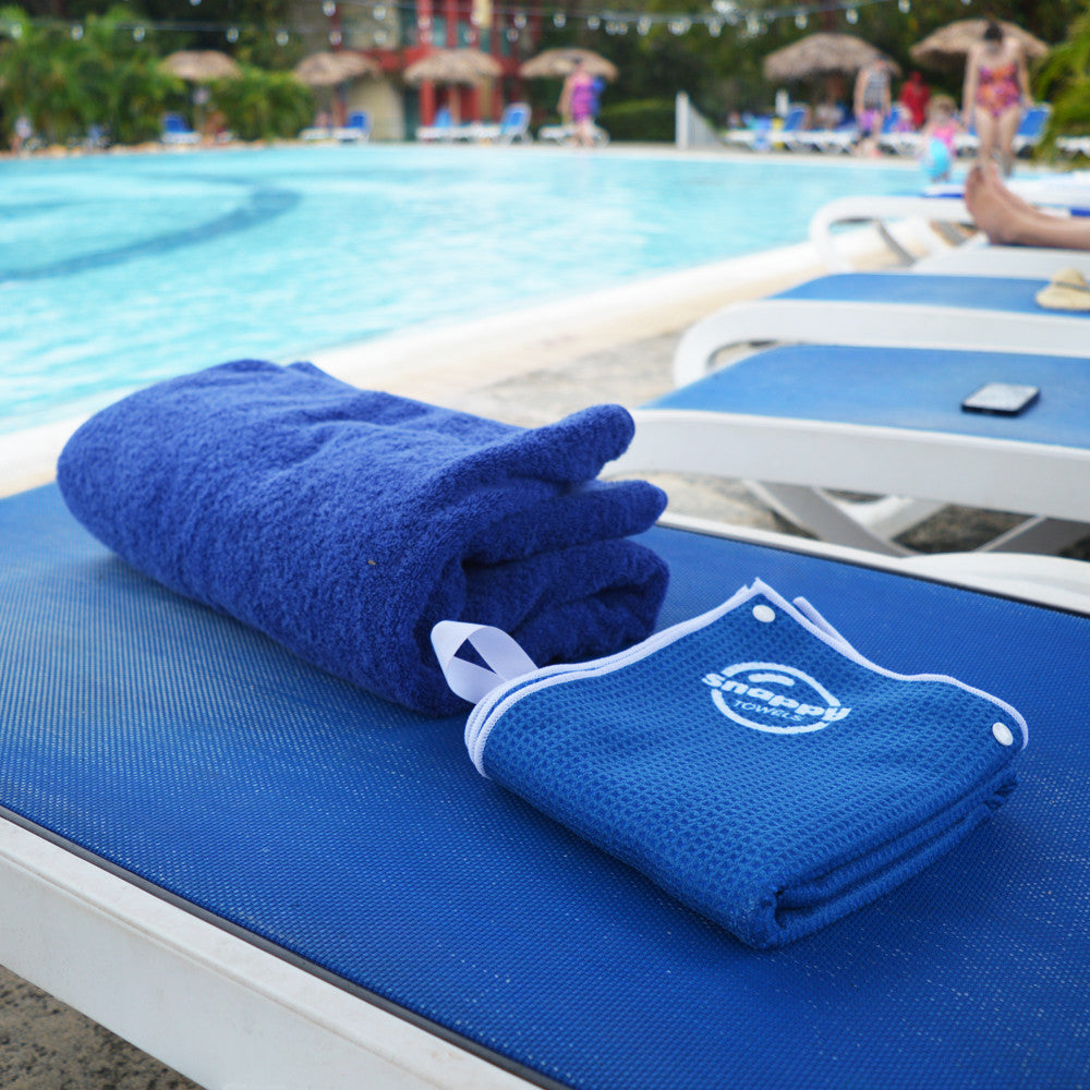 Compact yet comfortable microfiber beach towel. Snappy Towels pack up to 1/4 the size of a cotton beach towel. Stop carrying heavy cotton towels and start wearing a Snappy Towel.