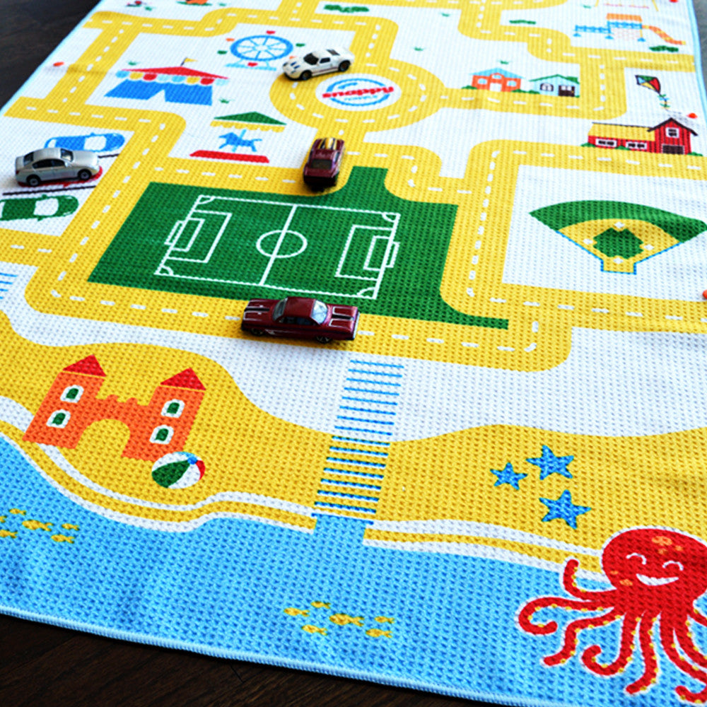 Play mat travel towels are designed with a play surface on one side for kids aged 1,2,3,4,5,6. Beach town design for action figures and toy cars.
