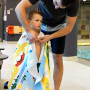 Play mat travel towel for kids, snaps on after a swim or bath to keep warm and dry off, hands-free!