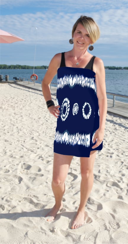 lady on beach wearing snappy midnight sky sport size towel