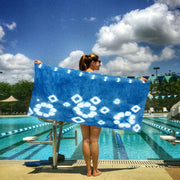 snappy eco collection sport towel indigo blue woman at pool
